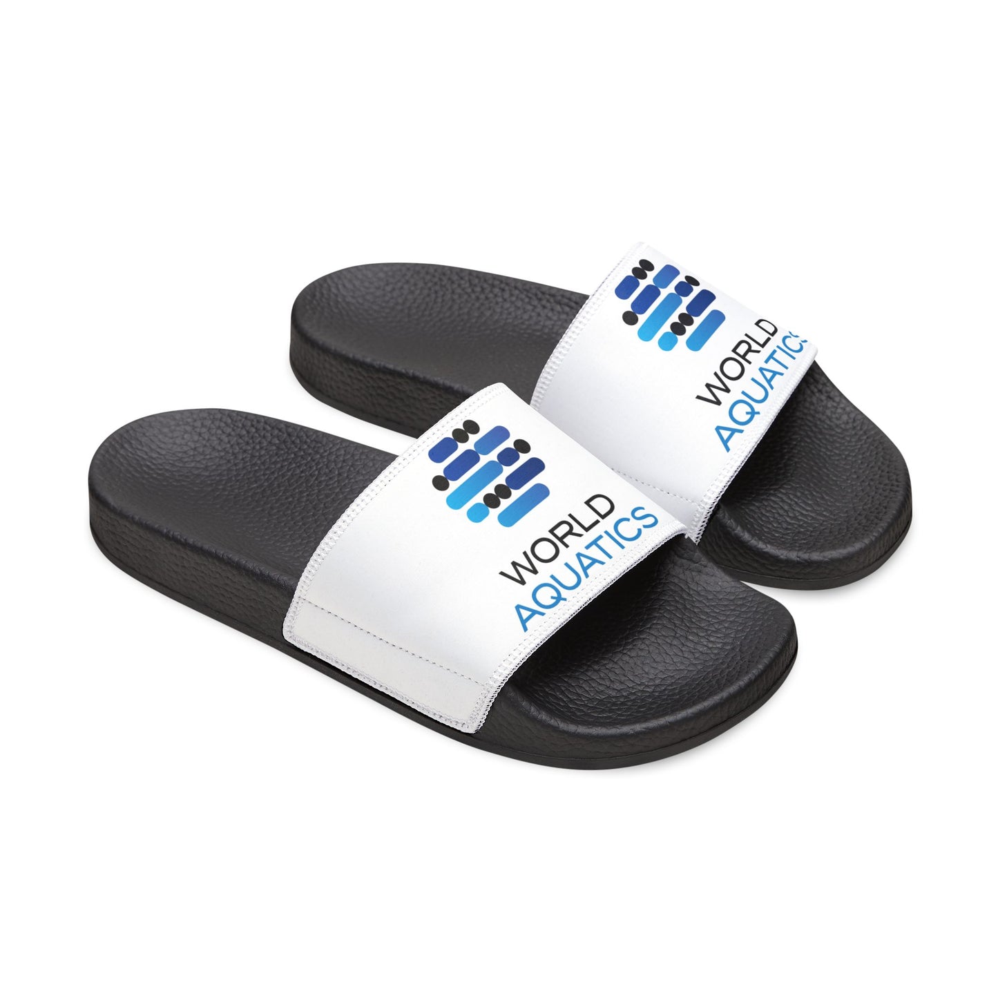 Lifestyle photo of World Aquatics Men’s Sandals worn by a man at the beach – stylish, easy-to-wear, perfect for summer.
