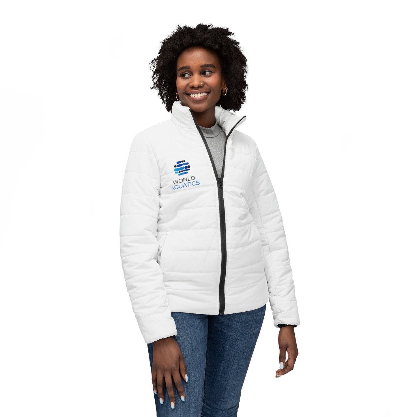 Woman wearing World Aquatics Puffer Jacket – lightweight quilted jacket with logo, designed for warmth and everyday comfort.