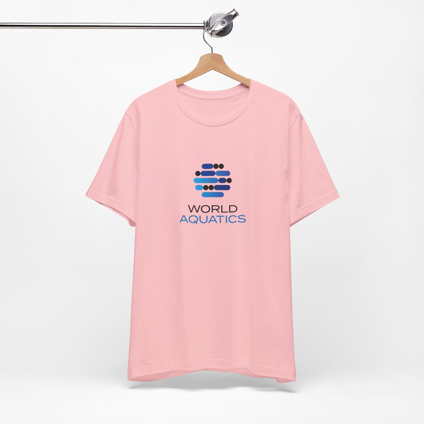 Pink t-shirt with World Aquatics logo on a hanger against a white background