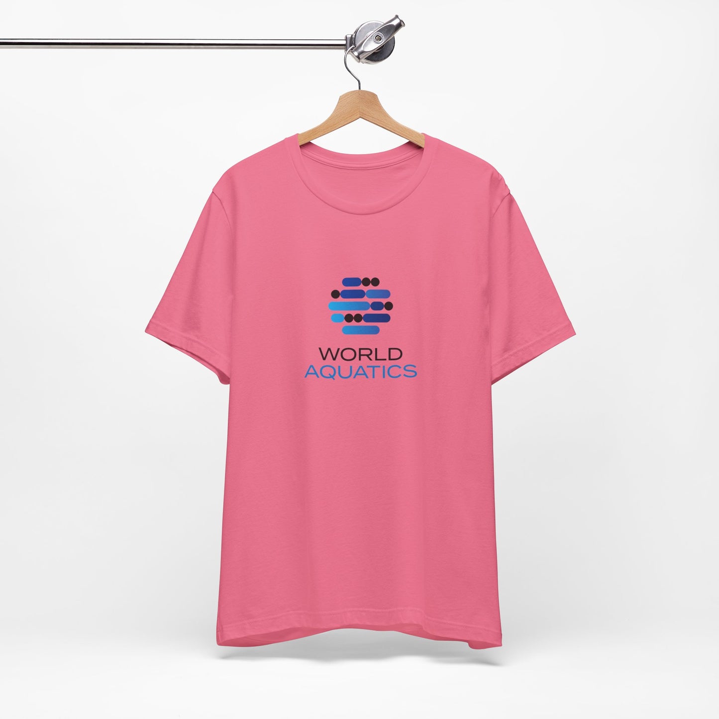 Pink t-shirt with World Aquatics logo on a hanger against a white background