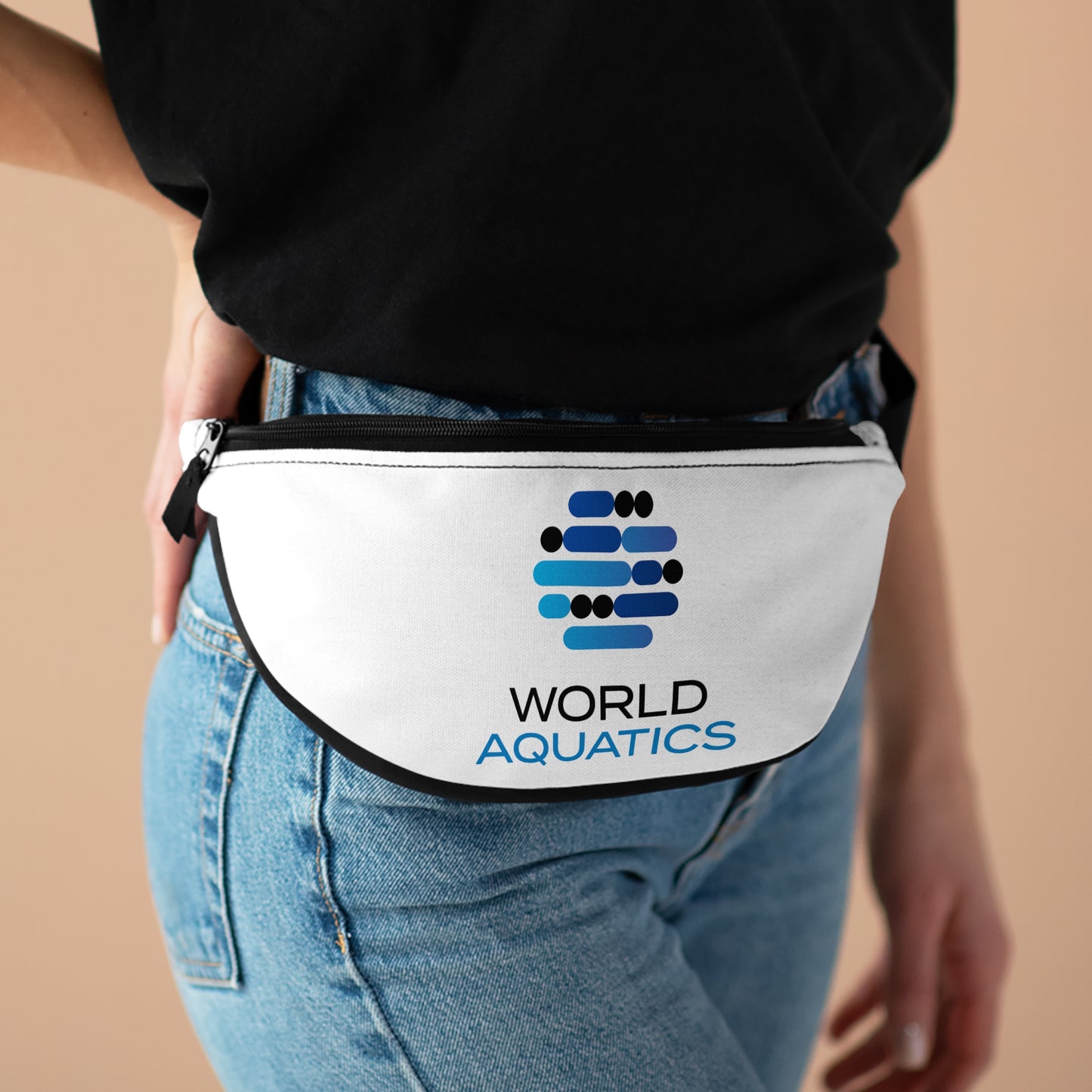 Person wearing a white belt bag with World Aquatics logo on a beige background