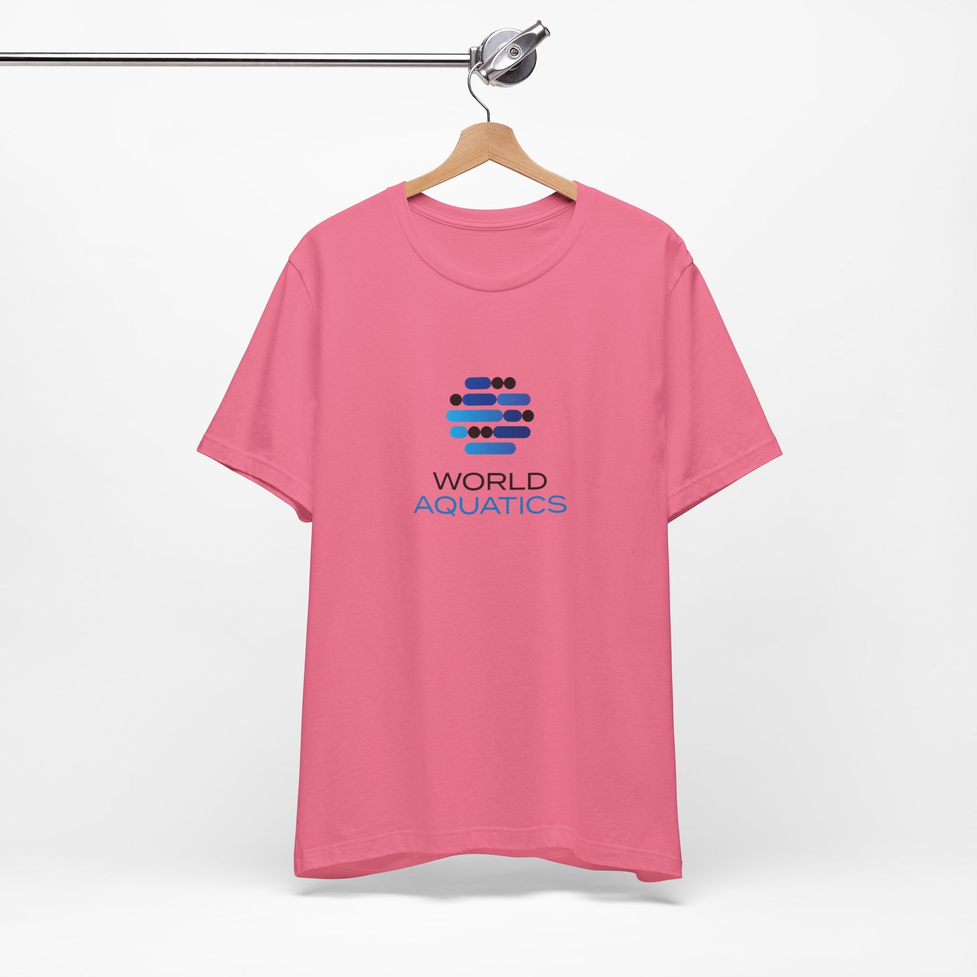 Pink t-shirt with World Aquatics logo on a hanger against a white background